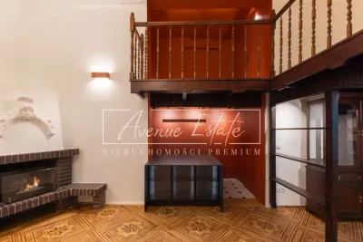 Dwupoziomowy apartament 102 m² przy Al. Ujazdowskich z kominkiem - miniatura 1