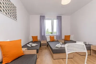 8-osobowe mieszkanie B1 w Przejazdowie przy ul. Sosnowej - miniatura 1